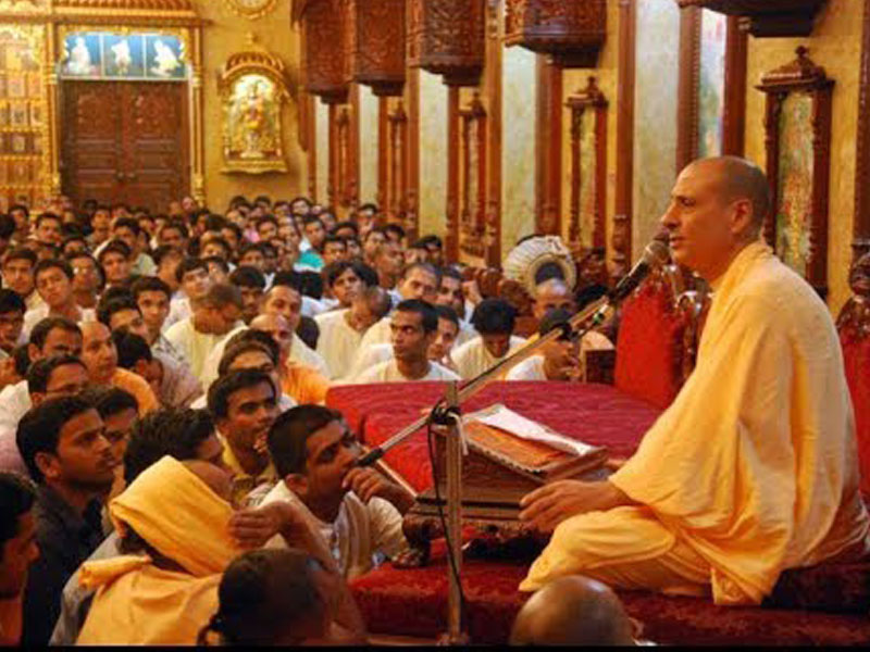 Giving Bhagavatam class to devotees